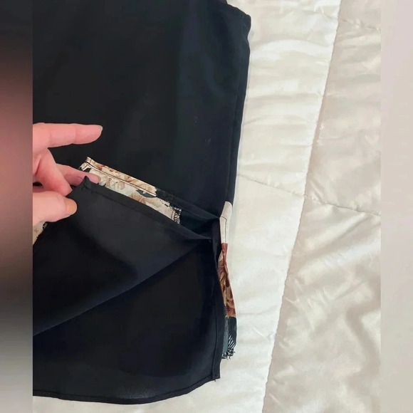 Versona loose fitting sleeveless top, black with fall color floral detail at hem - Picture 12 of 13